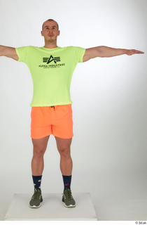 Joel dressed green sneakers orange shorts sports standing t-pose whole…